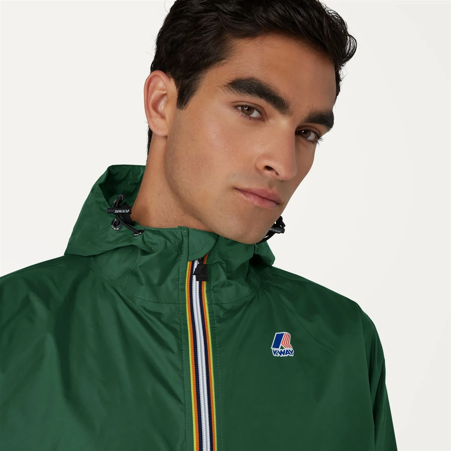 Claude - Unisex Packable Full Zip Waterproof  Rain Jacket in Green Dark