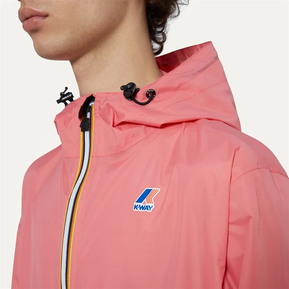 Claude - Unisex Packable Full Zip Waterproof  Rain Jacket in Pink