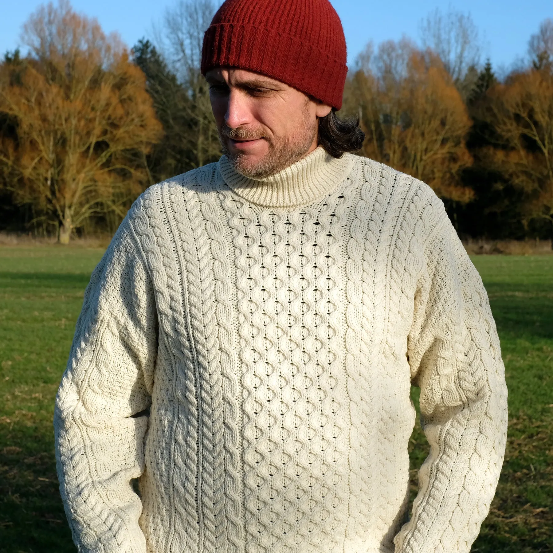 Traditional Aran polo neck sweater in Cream